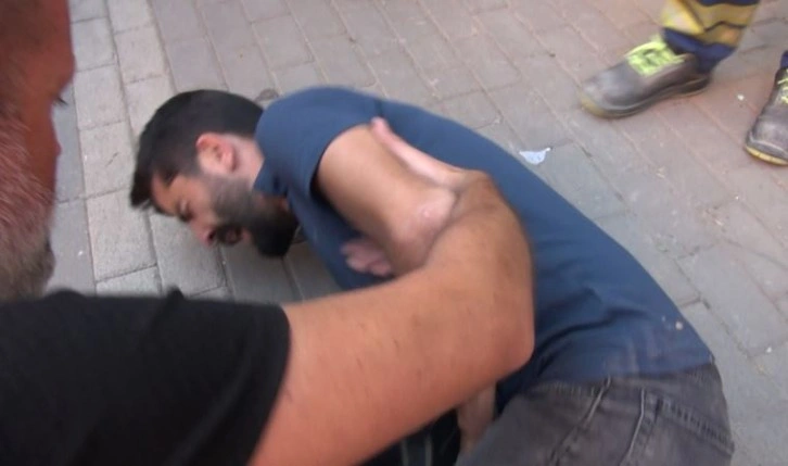 Yangın haberinde çekim yapan DHA muhabirine polisten şiddet