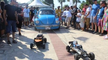 Hobi festivalinde kumandalı 2 elektrikli araçla 1 tonluk otomobil çekildi