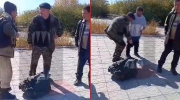 Putin'in seferberlik ilanıyla göreve çağrılan gencin ayakta bile duramadığı görüntü viral oldu